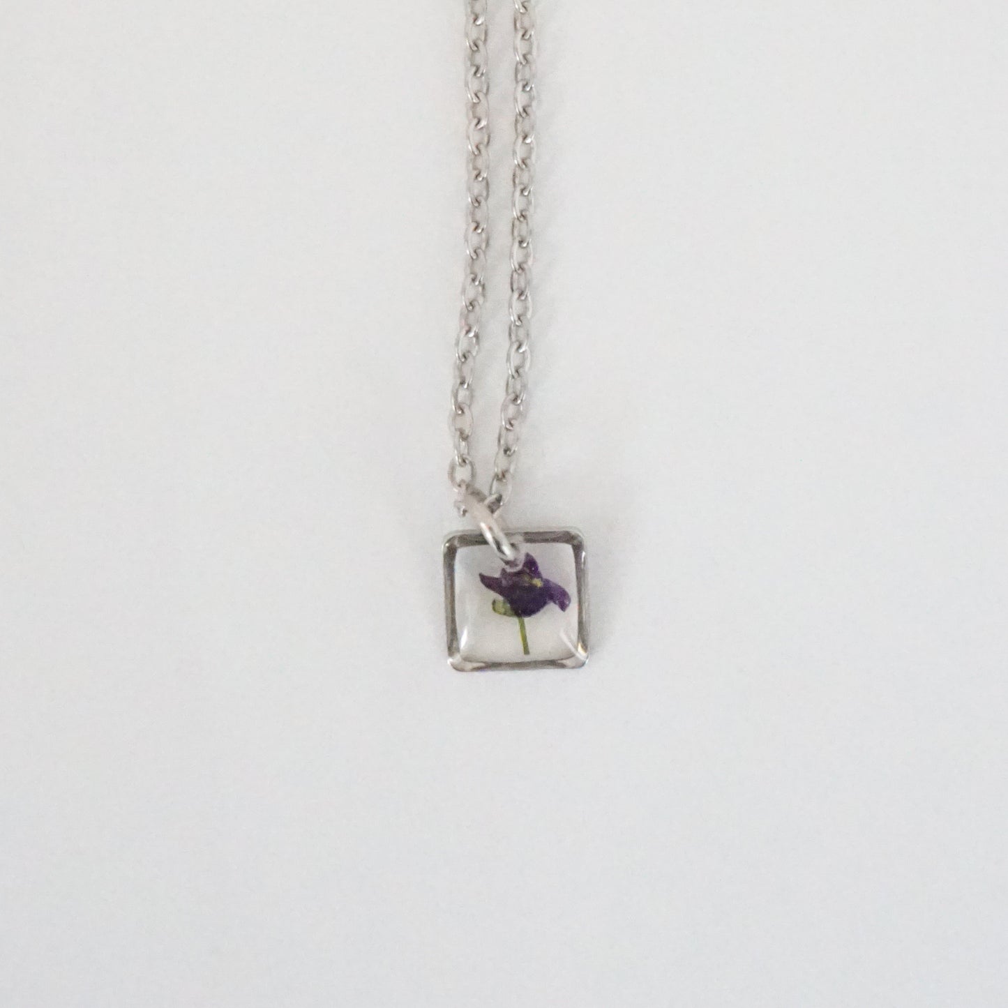 Dije panalillo morado