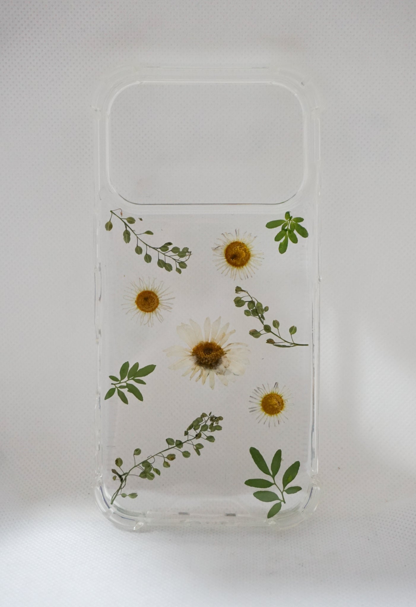 iPhone 17 Pro Lentejilla y margarita