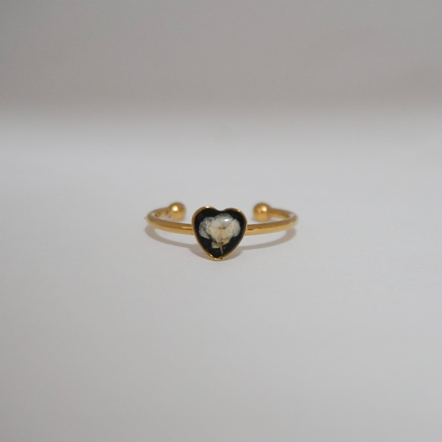 Anillo ajustable panalillo blanco fondo negro