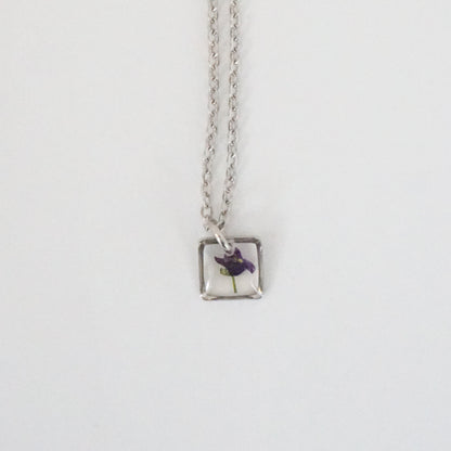 Dije panalillo morado