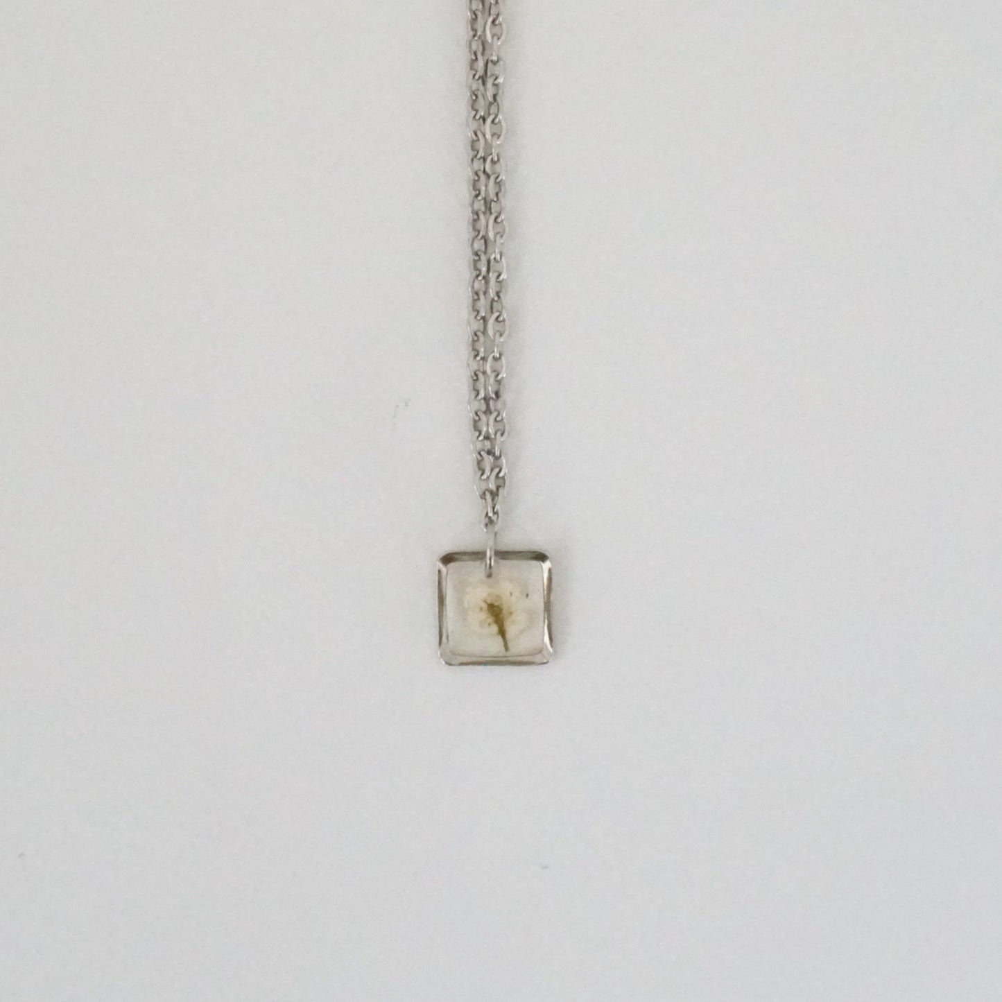 Dije panalillo blanco