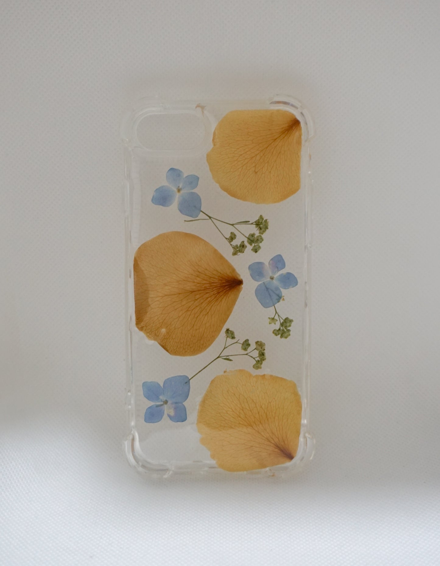 iPhone SE Hortensias y pétalos de rosa amarillos