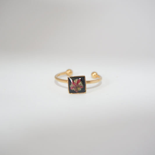 Anillo ajustable bugambilia fondo negro