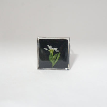 Anillo ajustable trueno de venus fondo negro