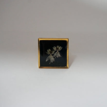 Anillo ajustable algodoncillo fondo negro