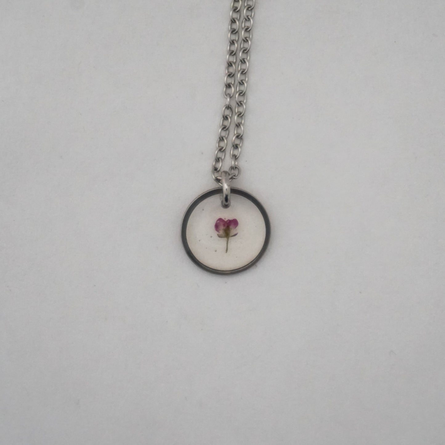 Dije panalillo fucsia