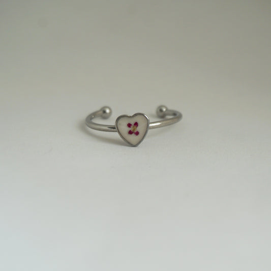 Anillo ajustable panalillo fucsia fondo blanco