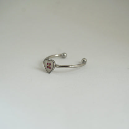 Anillo ajustable panalillo fucsia fondo blanco