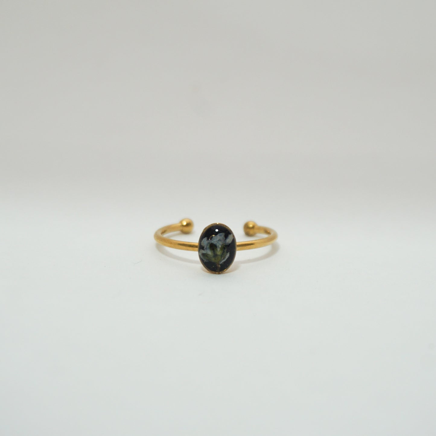 Anillo ajustable nomeolvides fondo negro