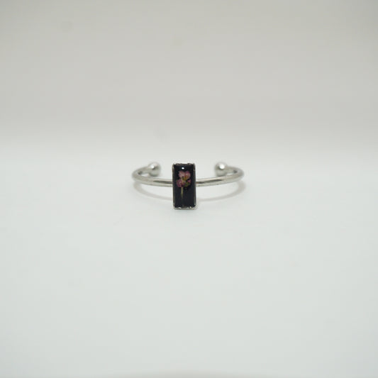 Anillo ajustable panalillo rosa fondo negro