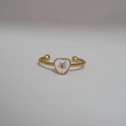 Anillo ajustable panalillo lila fondo blanco