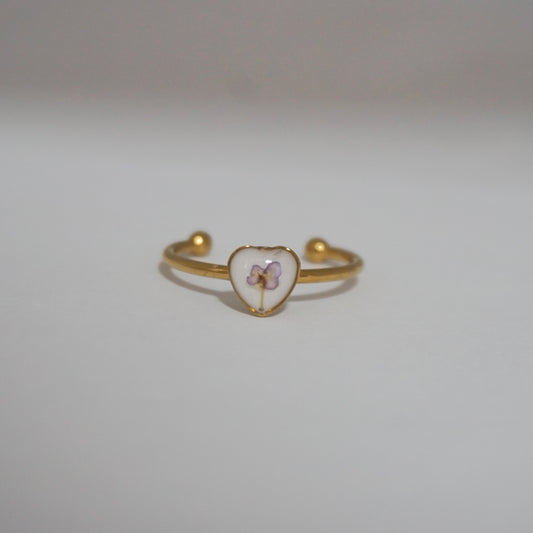 Anillo ajustable panalillo lila fondo blanco